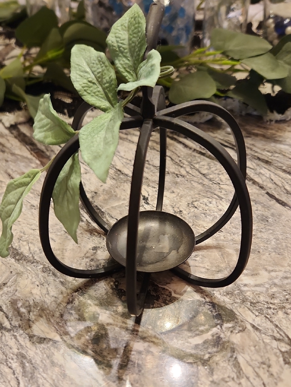 Black Metal Pumpkin Candle Holder with Green Faux Leaves